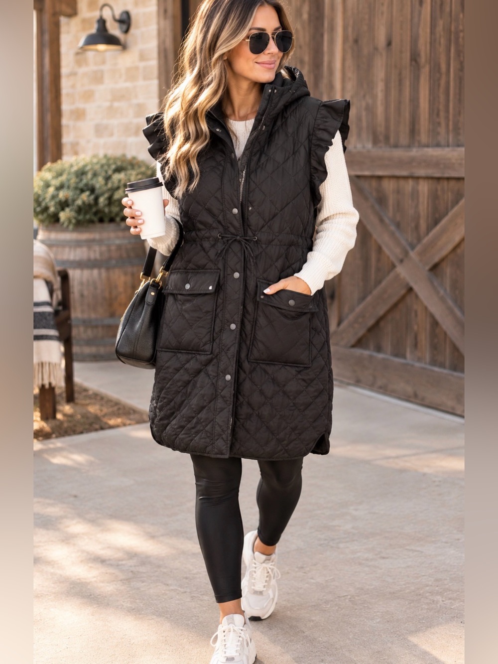 Timing Black Quilted Ruffle Sleeve Long Hooded Vest